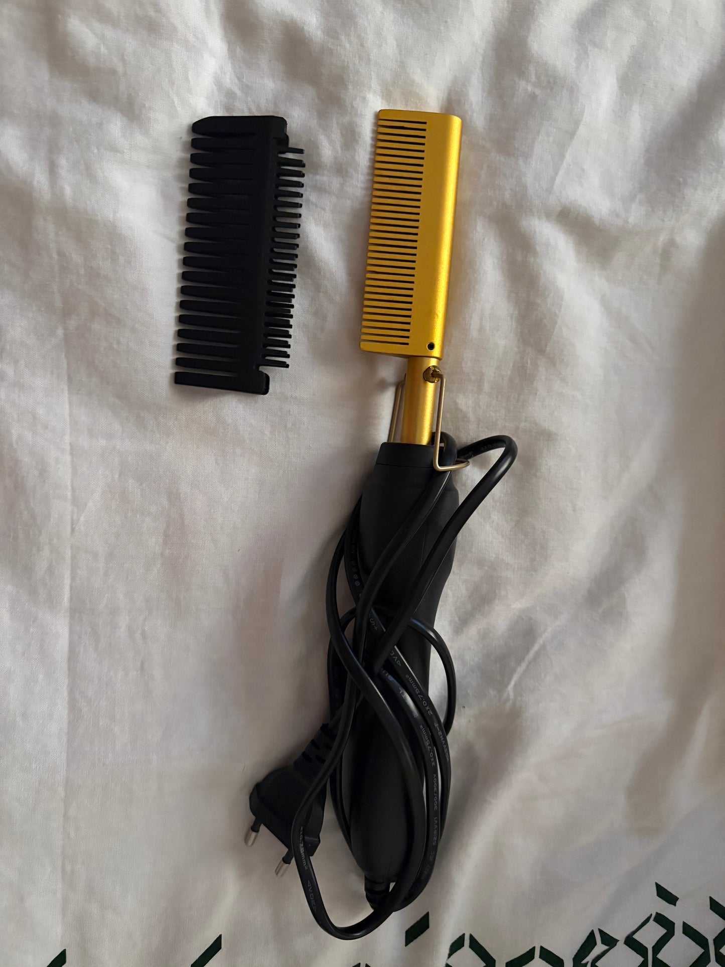 peigne chauffante et fer à boucler - Saint Louis - Vendu